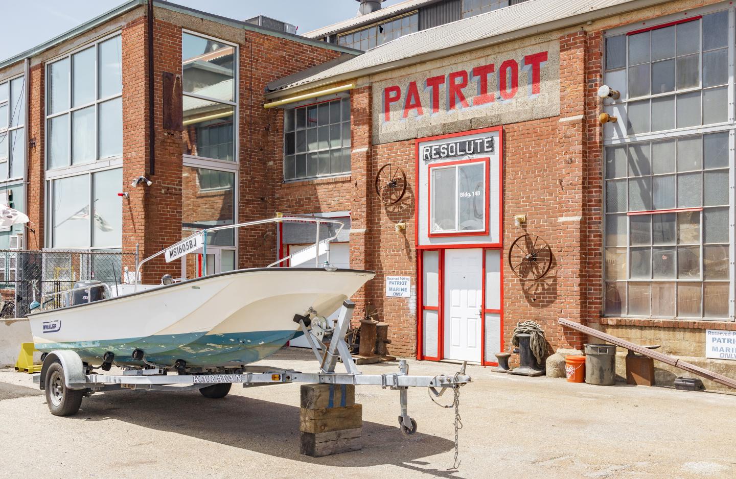 A boat in front of a building