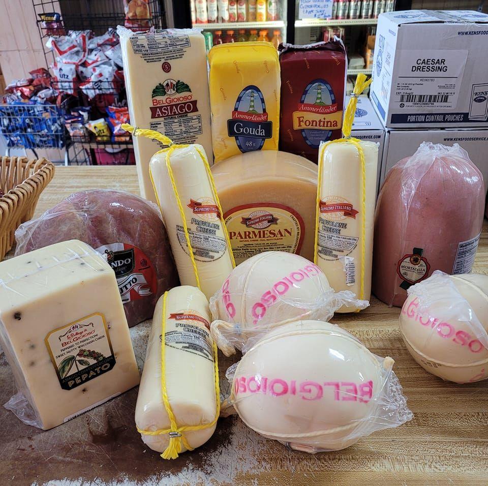 Cheese on table at Carmella’s Market