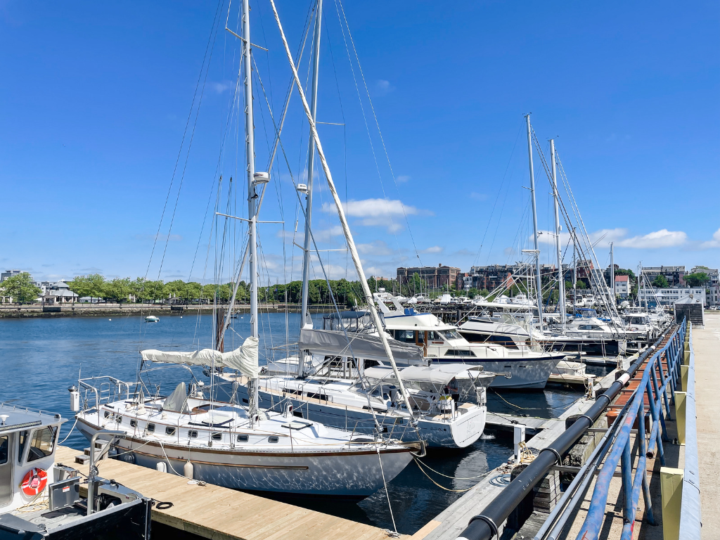 Row of boats long H Dock at Boston Harbor Shipyard and Marina